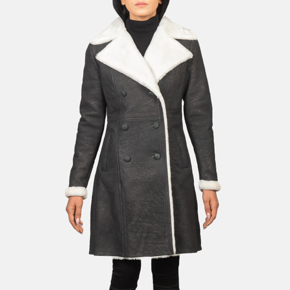 
Close-Up Detail of Notch & Leather Buttons Hardware on Women's Amie Black Double Breasted Shearling Coat