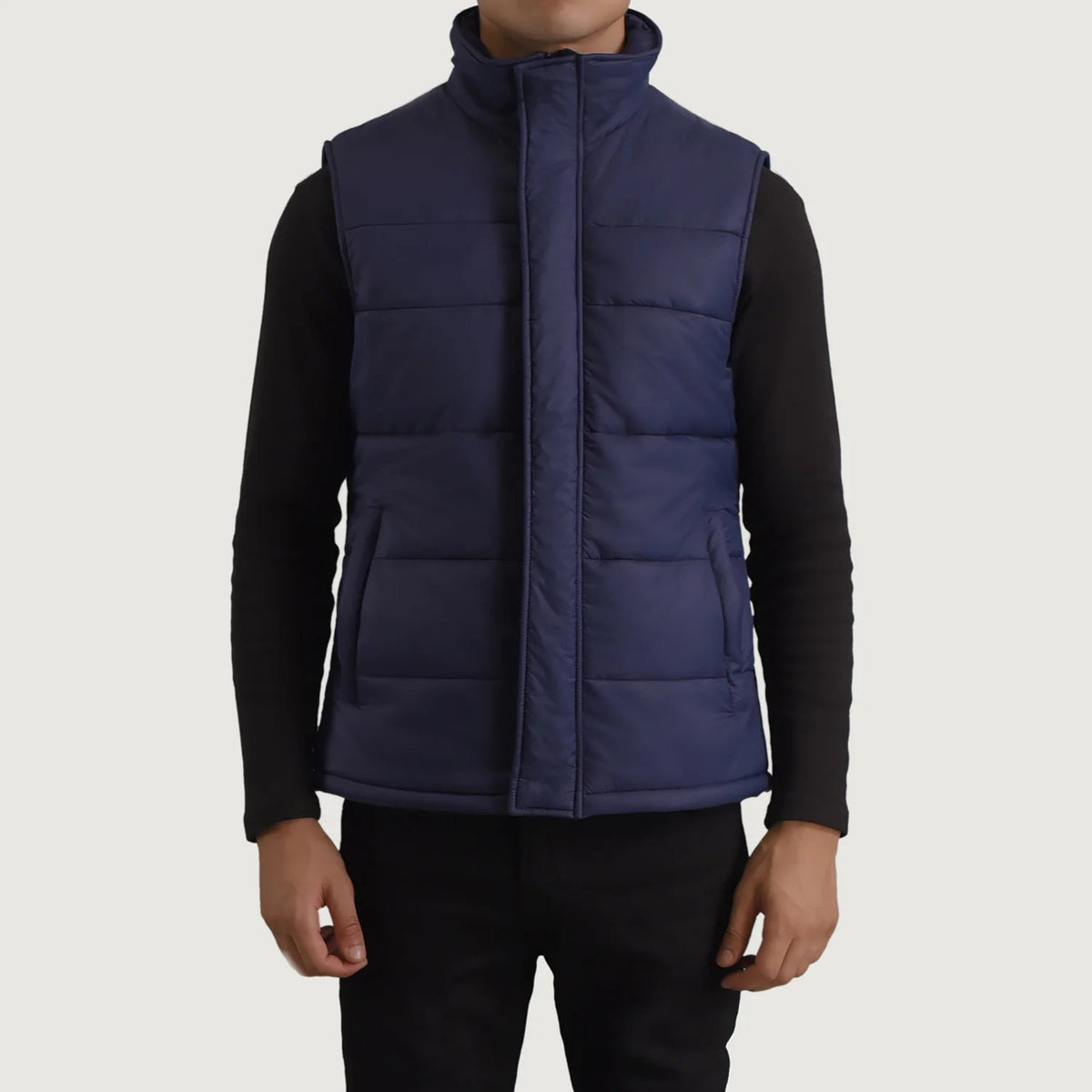 
Close-Up Detail of Classic Collar & Zipper With Placket Hardware on Bryan Blue Puffer Vest