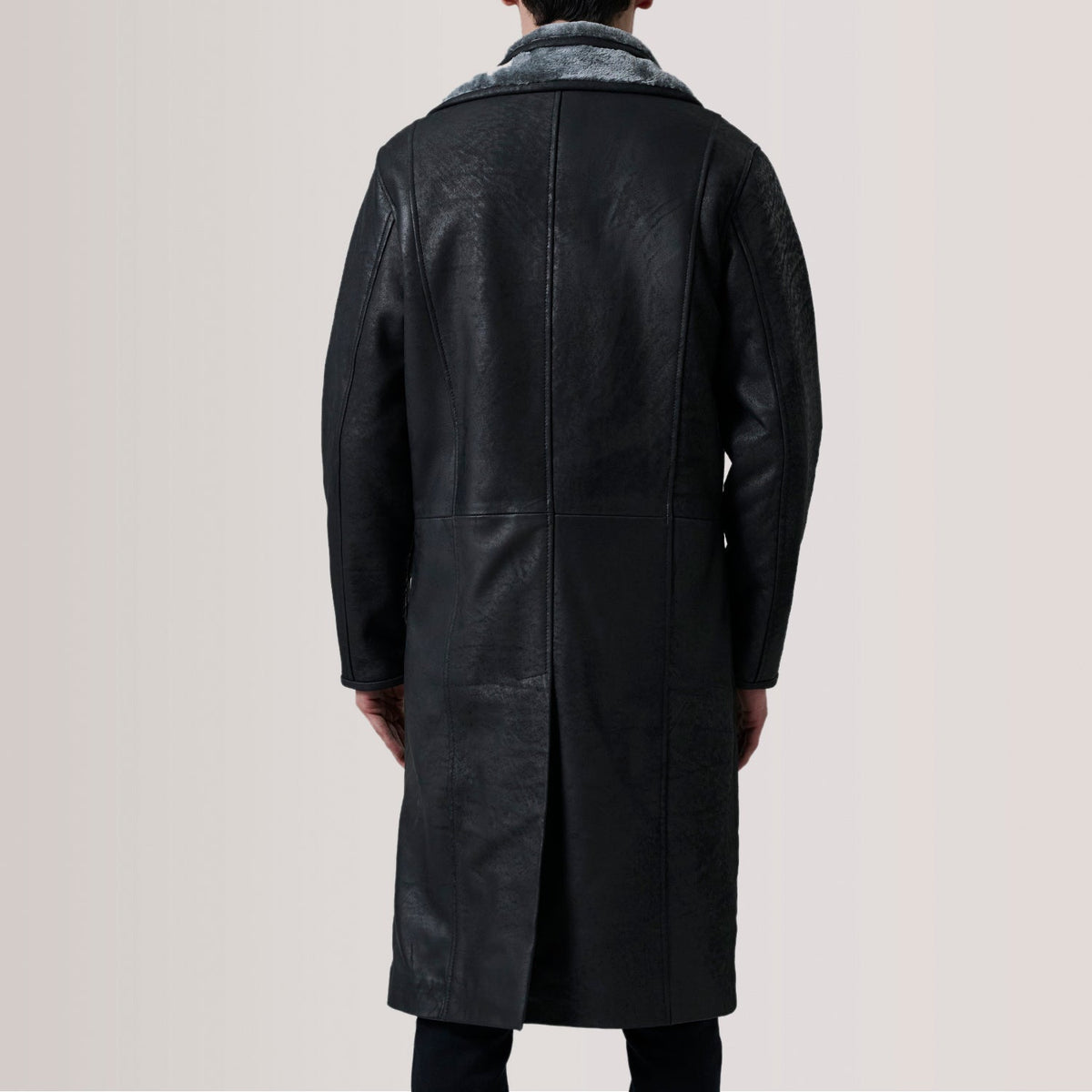 
Close-Up Detail of Notch & Button Hardware on Cai Distressed Black Leather Shearling Coat For Men