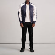 
Close-Up Detail of Varsity & Zipper Hardware on Clarke Blue Varsity Jacket