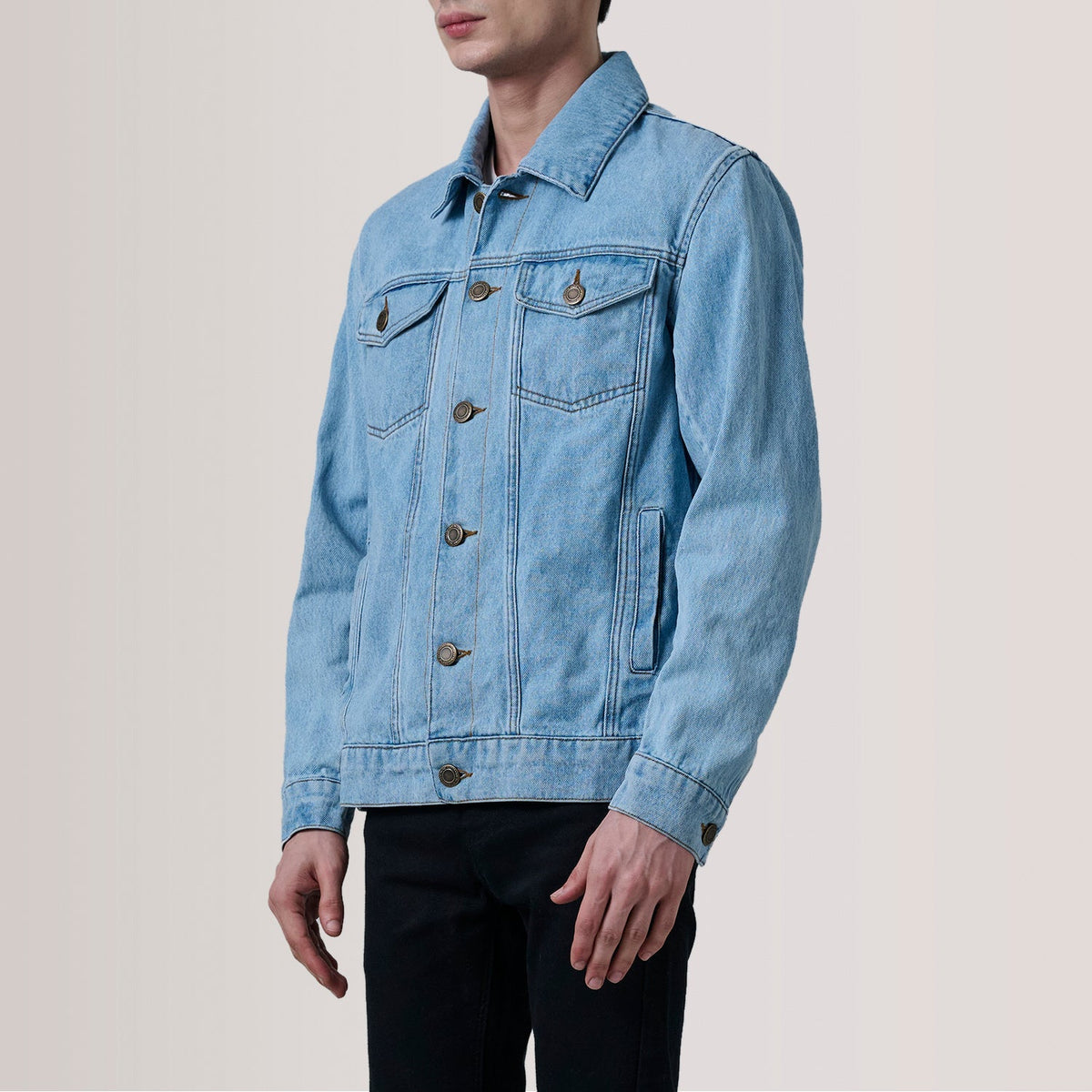 
Conard Light Blue Denim Trucker Jacket For Men - Lateral Side Profile View Showing Sleeve Cut & Athletic Taper Fit