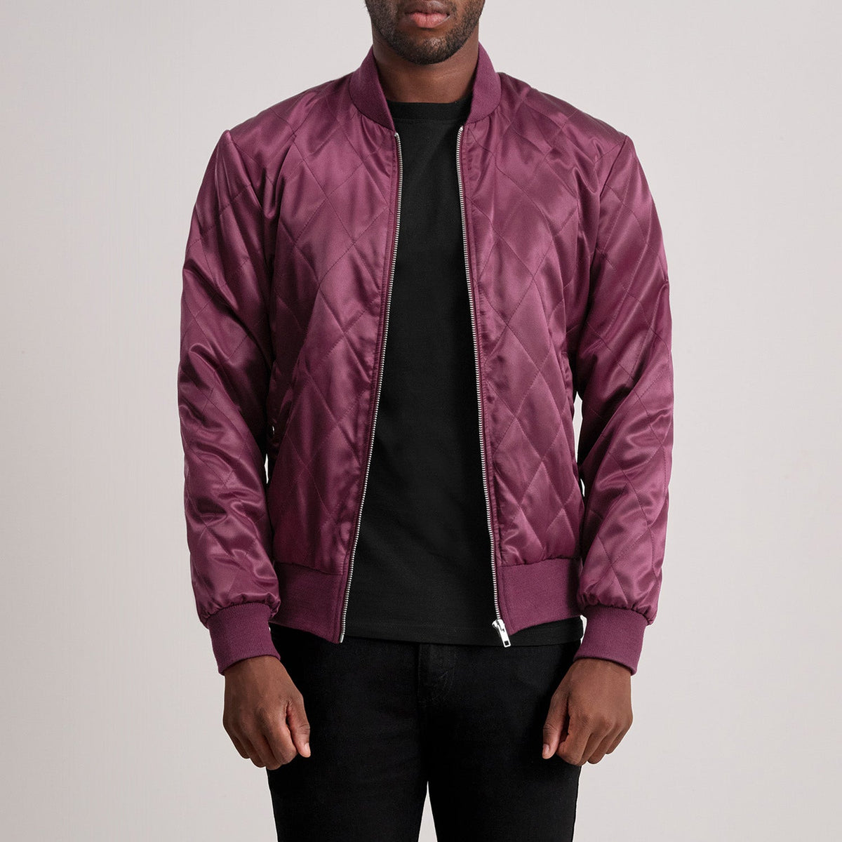 
Danson Quilted Maroon Varsity Jacket - Lateral Side Profile View Showing Sleeve Cut & Athletic Taper Fit
