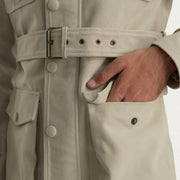 
Close-Up Detail of High neck with Belt & Snap button Hardware on Dolf Off-White Suede Jacket