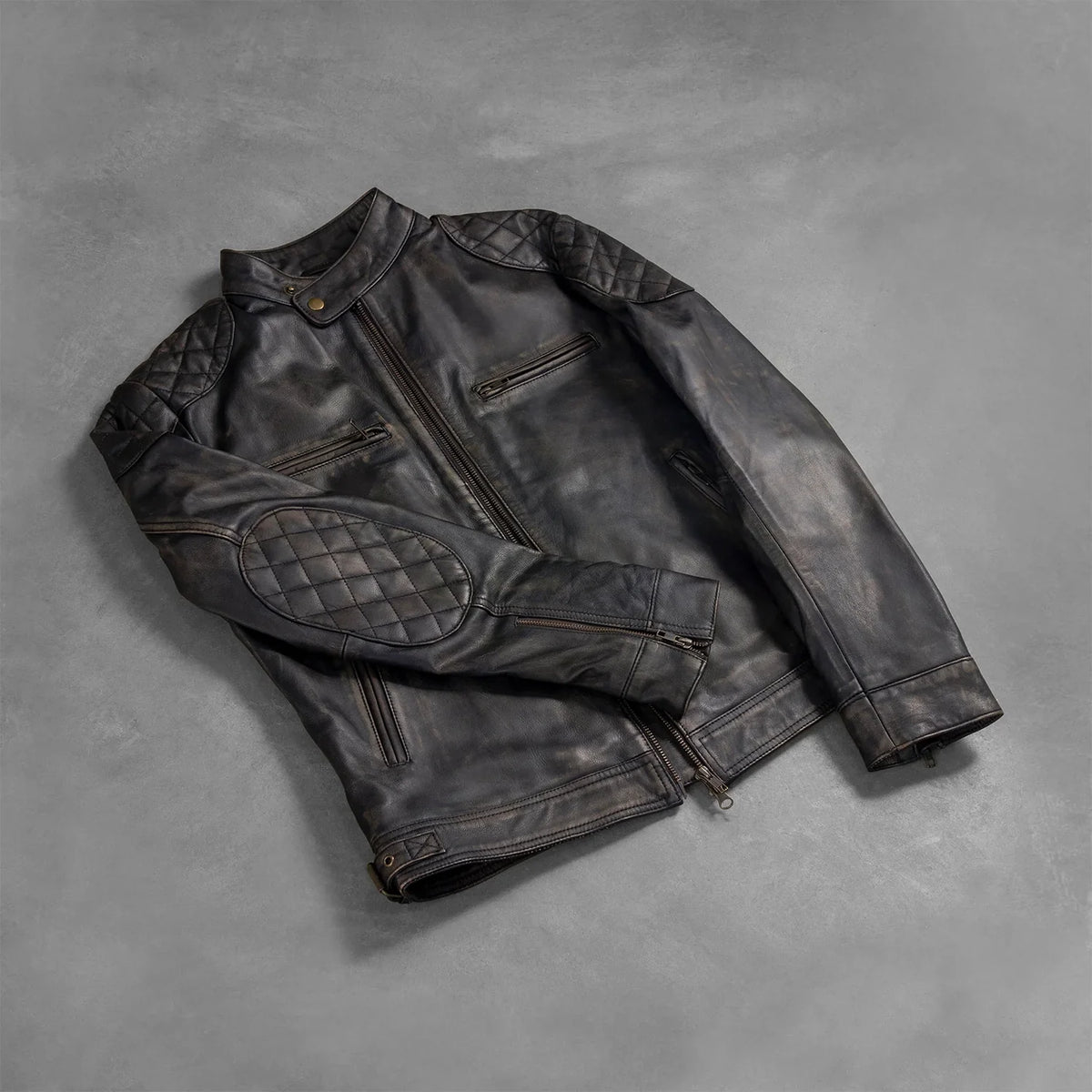 
Zipper & Hem Craftsmanship Construction Detail on Men's Gatsby Quilted Distressed Brown Leather Jacket