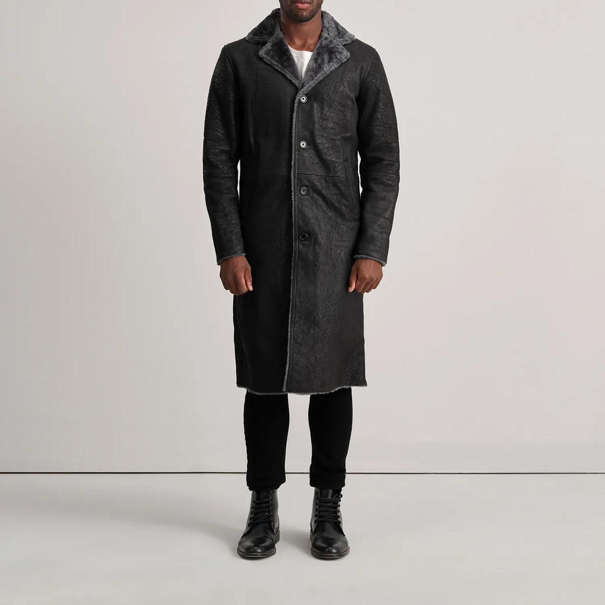 
Kolby Distressed Black Shearling Long Coat - Lateral Side Profile View Showing Sleeve Cut & Athletic Taper Fit