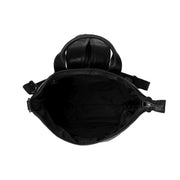 
Solid Antique Brass Hardware & Heavy-Duty Dual Zipper Detail on Saar Full-Grain Leather Backpack