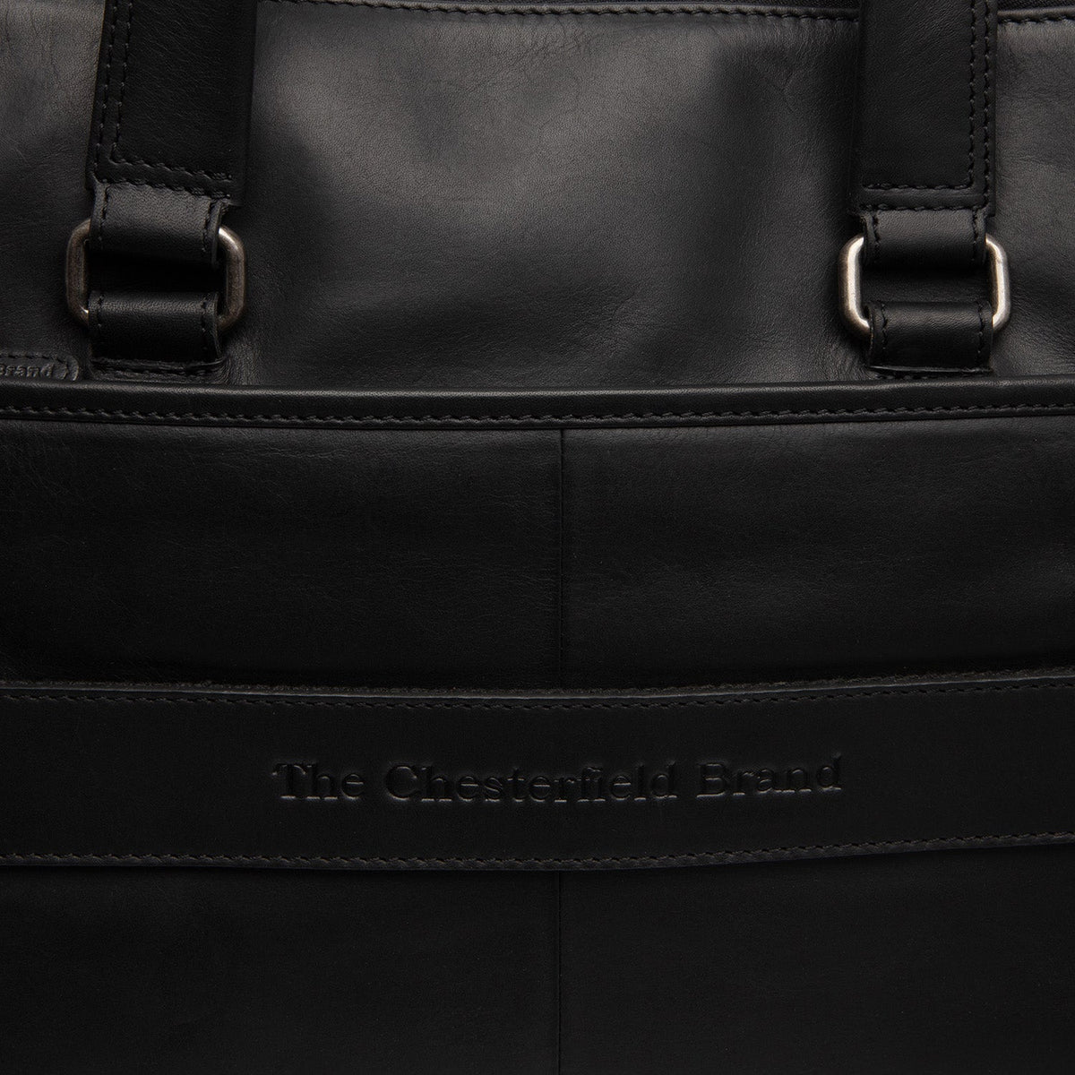 
100% Full-Grain Wax Pull-Up 100% Full-Grain Leather Grain Texture & Handcrafted Patina Detail