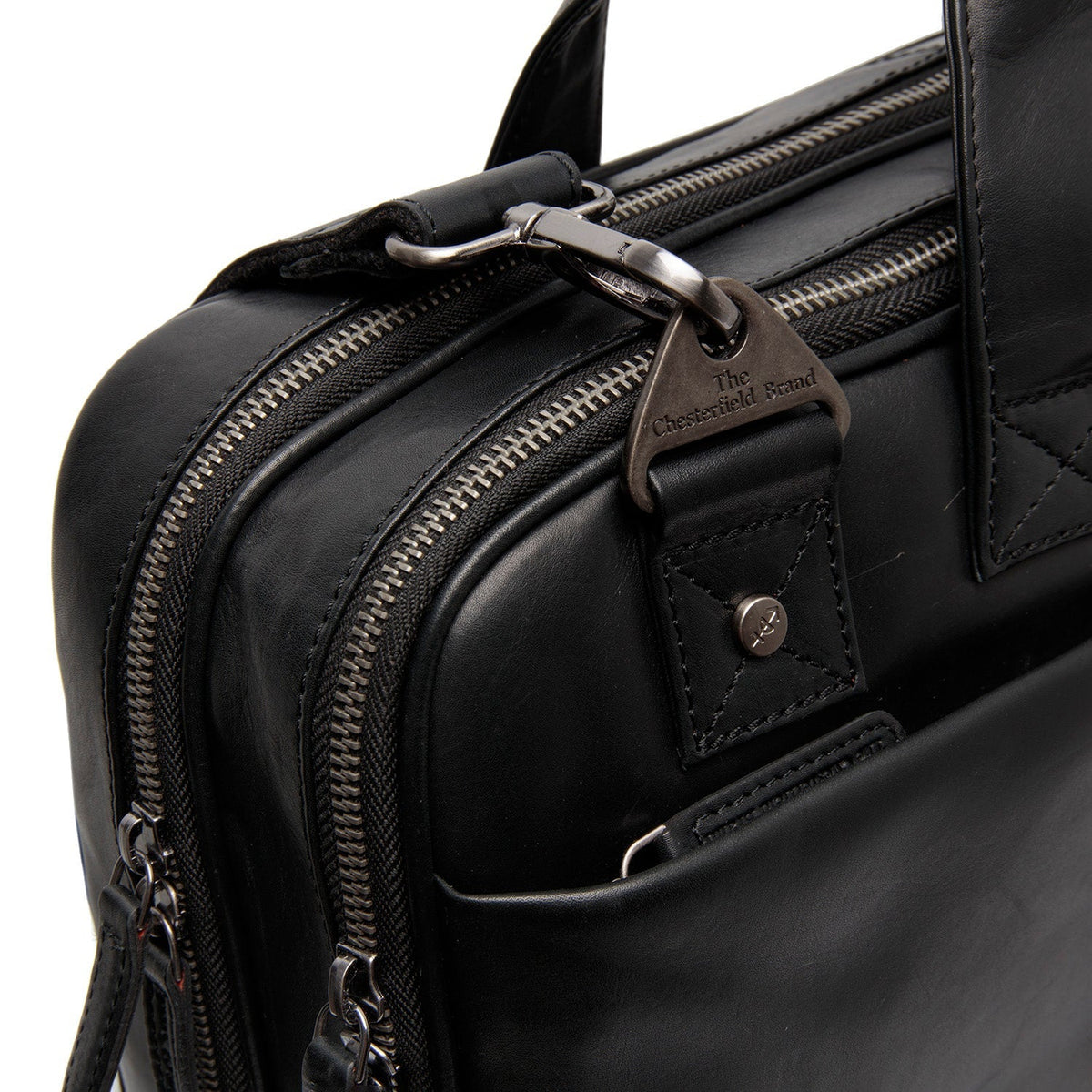 
Solid Antique Brass Hardware & Heavy-Duty Dual Zipper Detail on Iseo Full-Grain Leather Laptop Bag