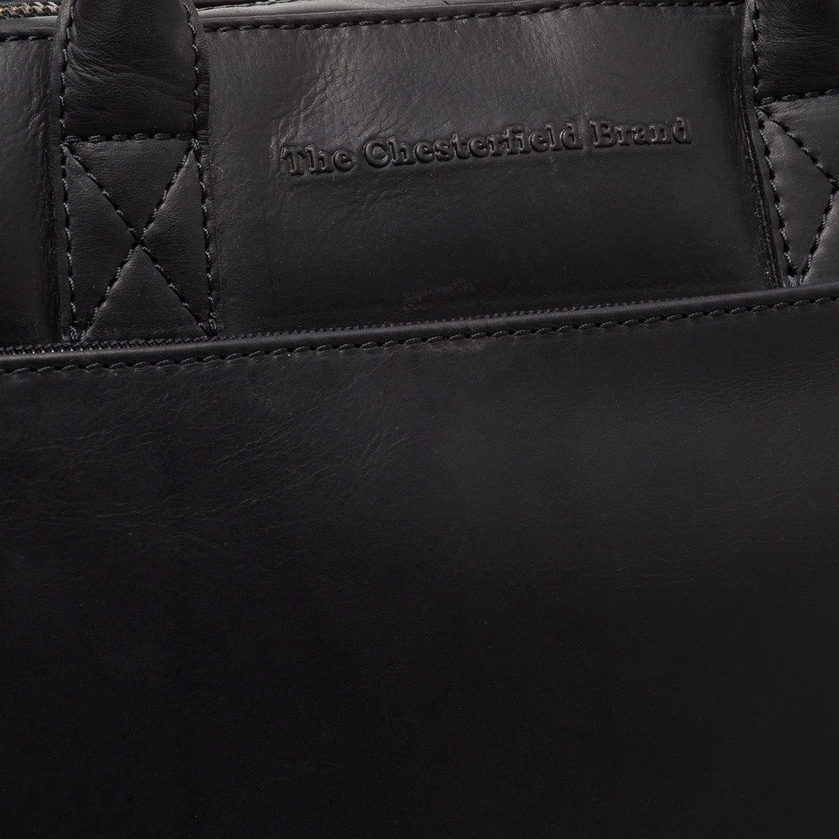 
Solid Antique Brass Hardware & Heavy-Duty Dual Zipper Detail on Tilbury Full-Grain Leather Laptop Bag