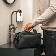 
Stefan Full-Grain Leather Toiletry Bag - Lateral Side Profile View Showing Sleeve Cut & Athletic Taper Fit