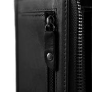 
Solid Antique Brass Hardware & Heavy-Duty Dual Zipper Detail on Nova Full-Grain Leather Wallet