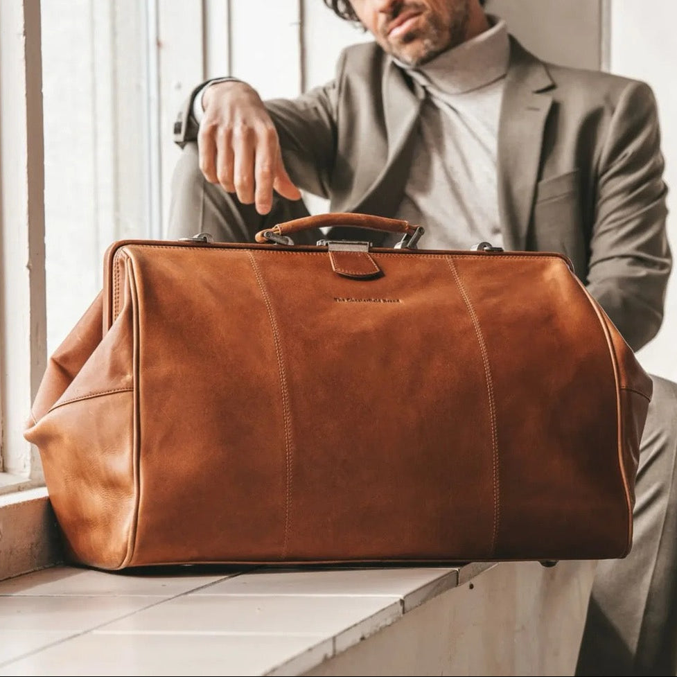 
Classic 100% Full-Grain Leather Duffle Bag - Rear Perspective Showing Reinforced Leather Straps & Stitching