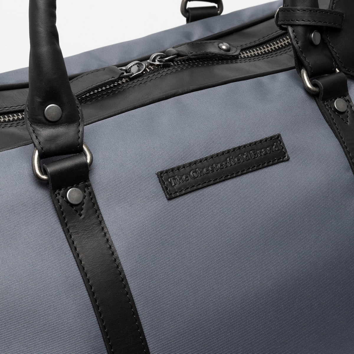 
100% Full-Grain Wax Pull-Up 100% Full-Grain Leather Grain Texture & Handcrafted Patina Detail