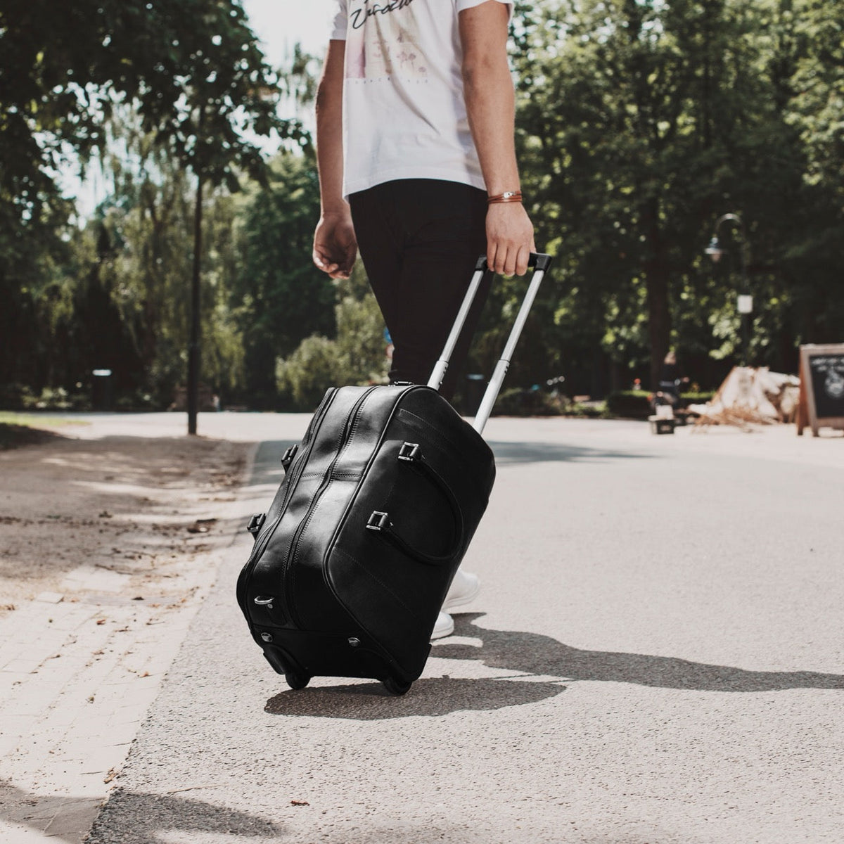 
Classic 100% Full-Grain Leather Duffle Bag - Rear Perspective Showing Reinforced Leather Straps & Stitching
