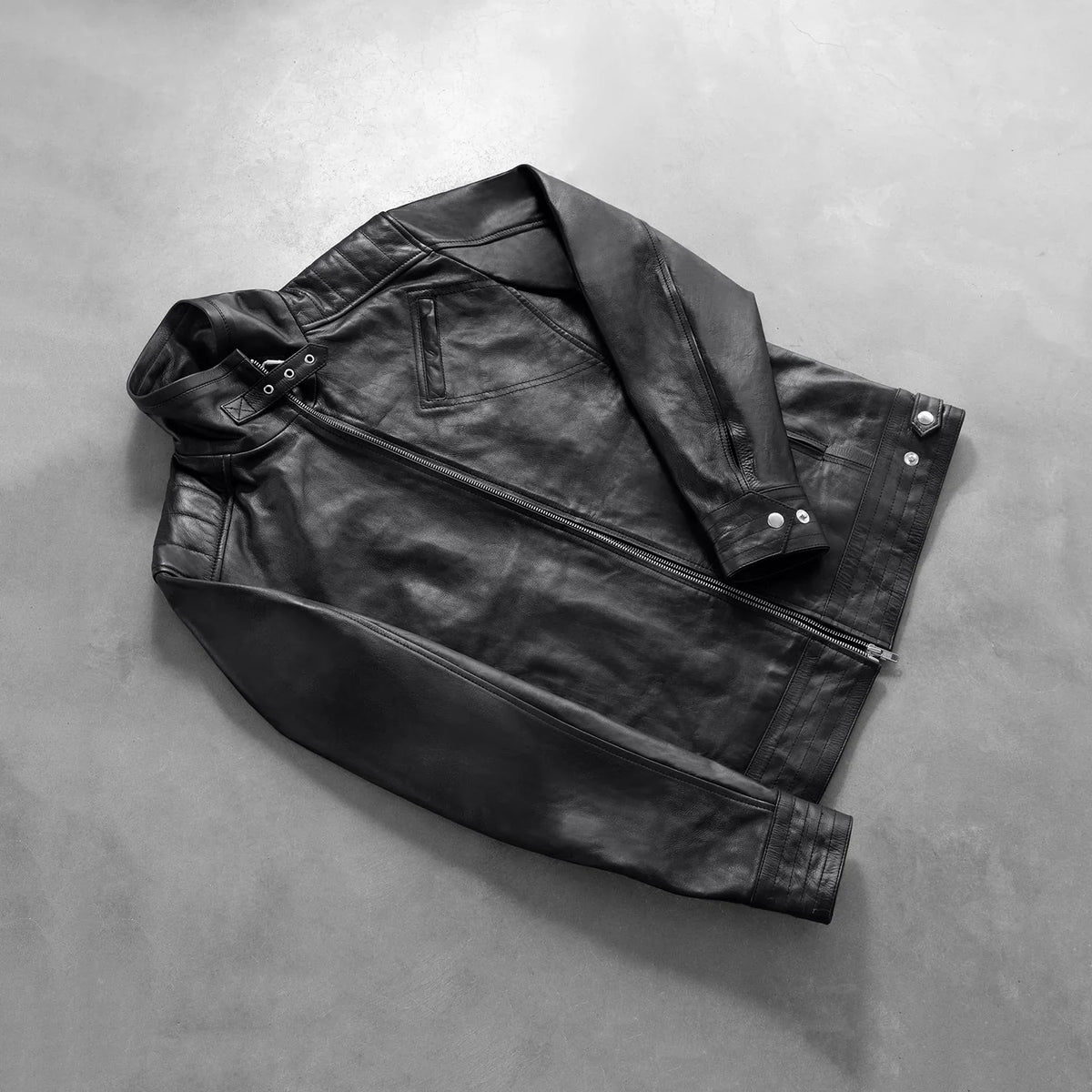 
Styled Fit Perspective of Men's Legacy Black Leather Biker Jacket on Model - Natural Daylight Drape