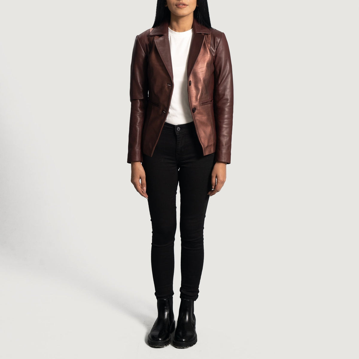 
Close-Up Detail of Notch & Button Hardware on Women's Ruby Metallic Maroon Leather Blazer