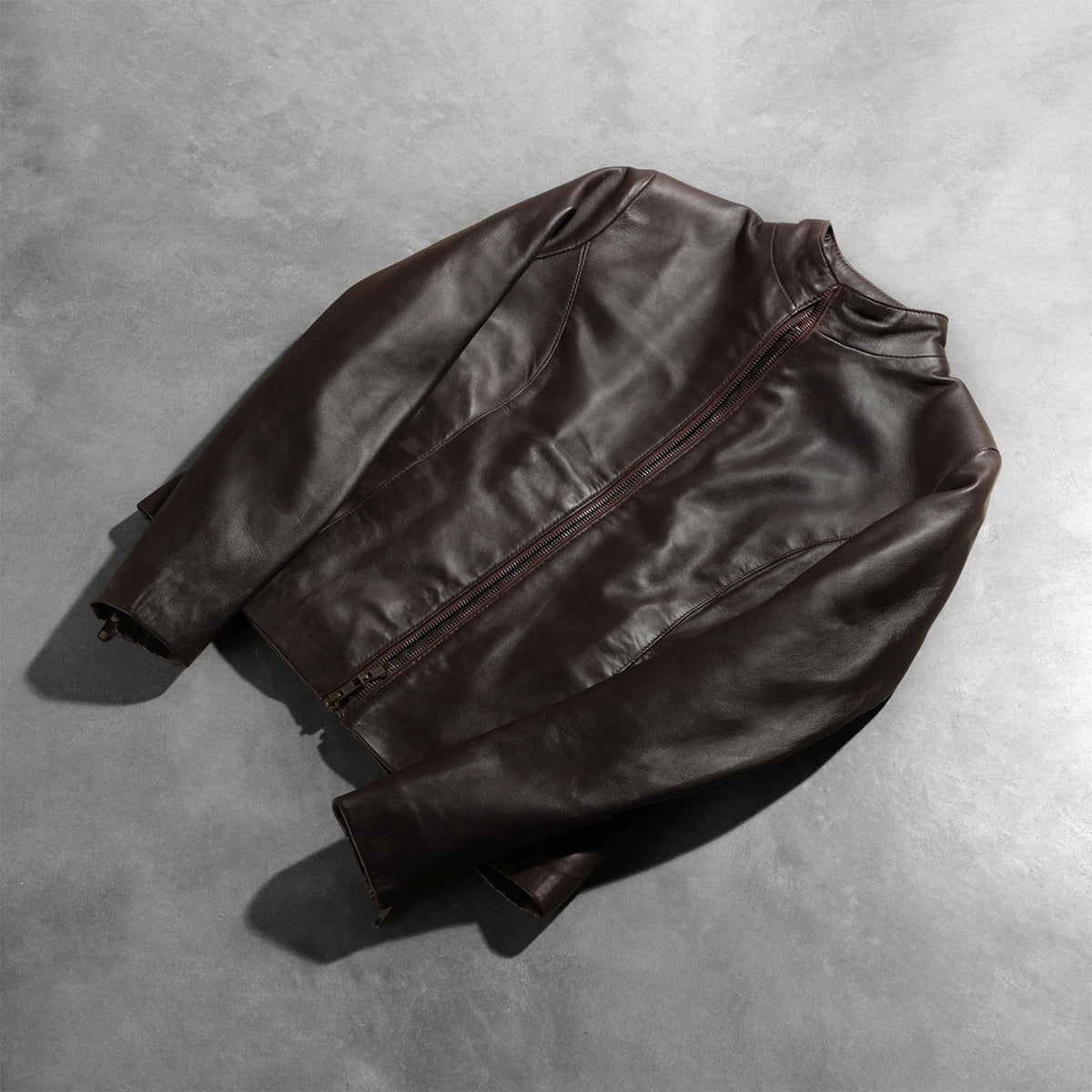 
Styled Fit Perspective of Women's Rumella Maroon Leather Biker Jacket on Model - Natural Daylight Drape