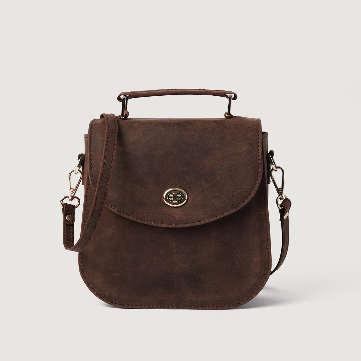 
The Sandra Vintage Distressed Brown Leather Saddle Bag For Women in Distressed Brown Full-Grain Leather - Full Exterior Front Profile View | Buy Online