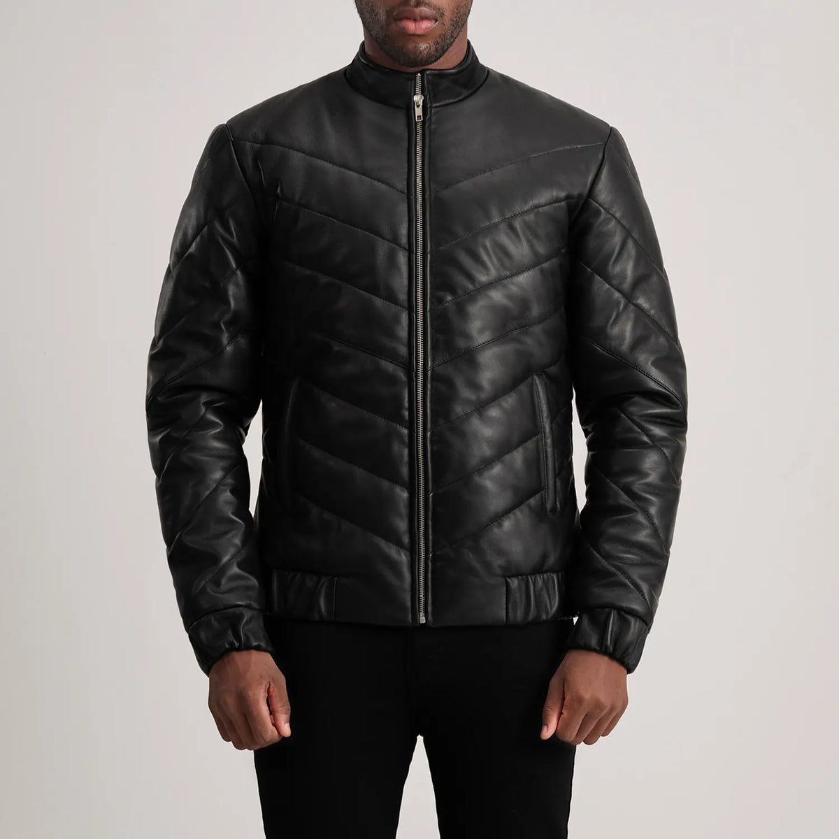
Close-Up Detail of Classic Collar & Zipper Hardware on Travis Black Leather Puffer Jacket
