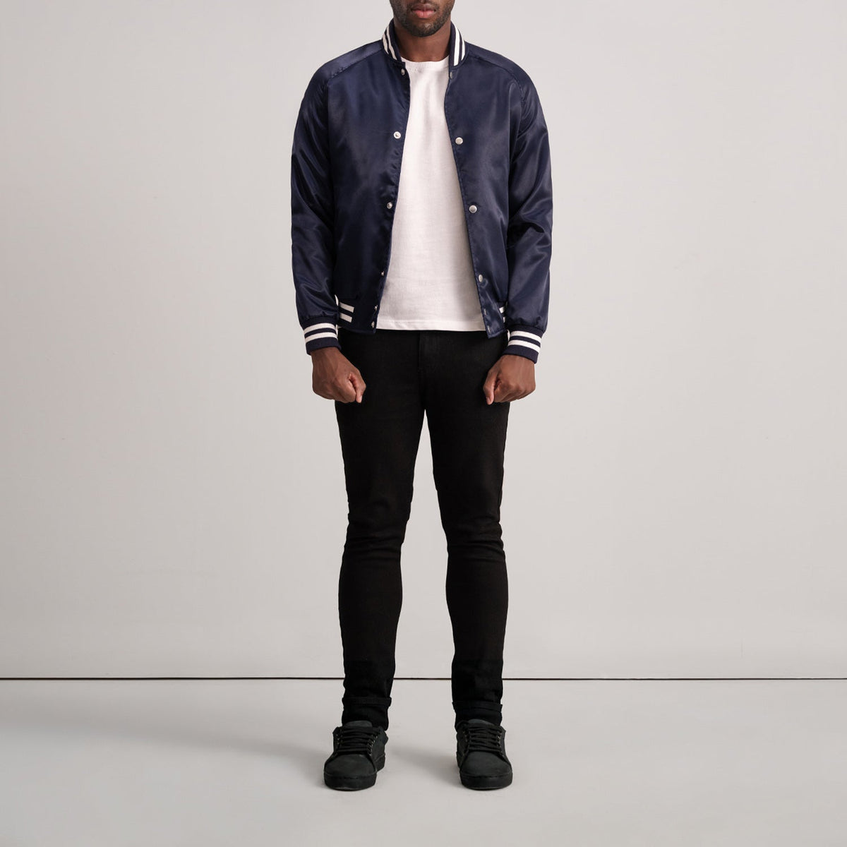 
Close-Up Detail of Varsity & Button Hardware on Xander Blue Varsity Jacket